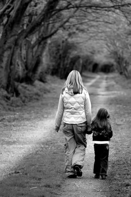 mother walking with daughter
