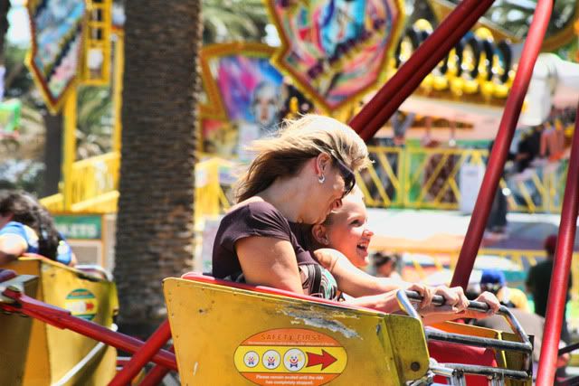 mother and daughter on a carnival ride