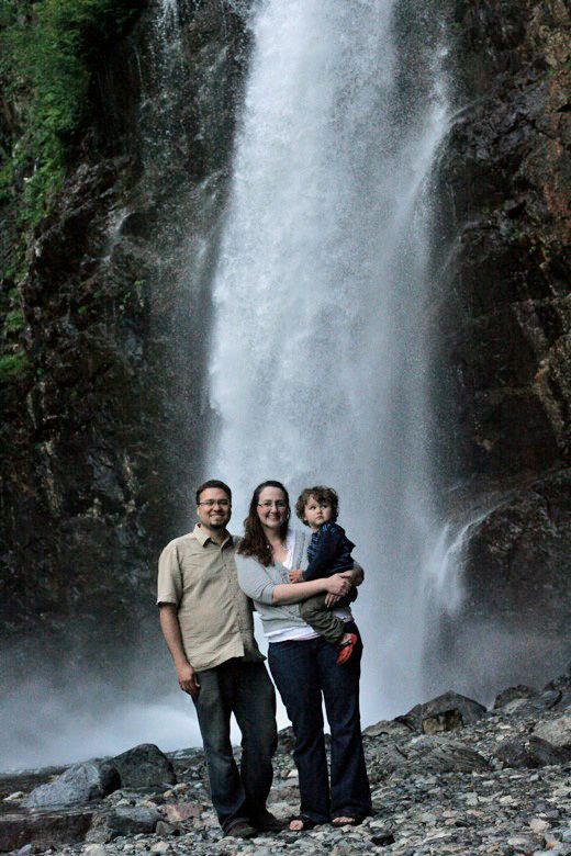 family at the waterfall
