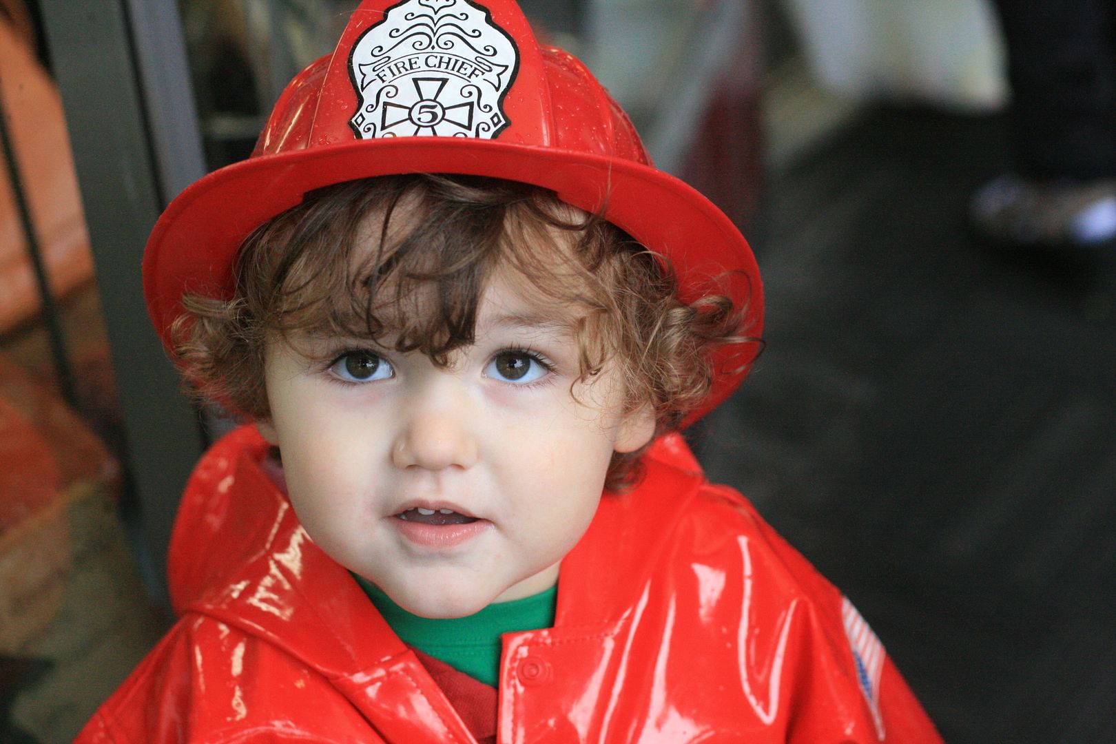 3 year old in firefighter costume on Halloween