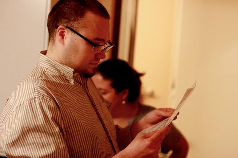homebirth — husband and helper setting up the birthing room sam