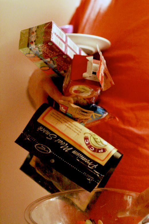 Alrik's birth story: Sweet surprise unassisted home water birth = Hobo Mama homebirth — husband holding labor snacks sam
