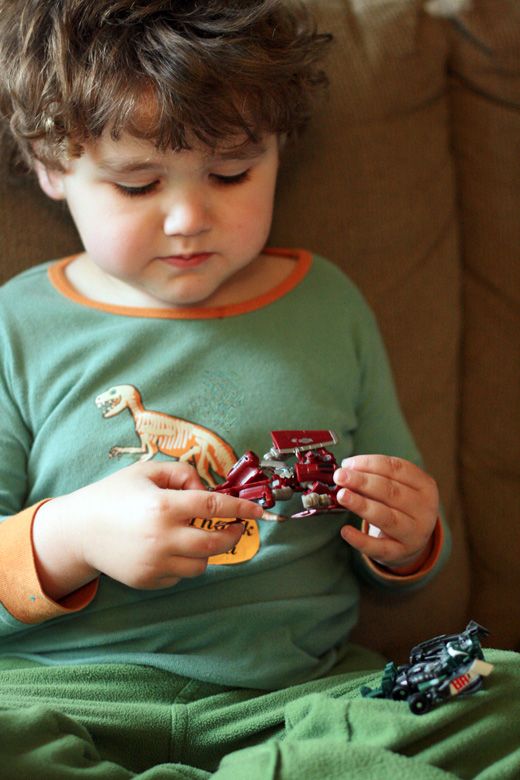 Photo Credit: Hobo Mama boy playing with Transformers toys
