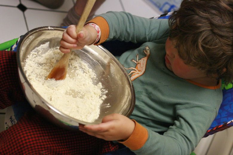 Celebrating Advent week to week: Hobo Mama boy mixing dough for Communion Jesus bread — home church