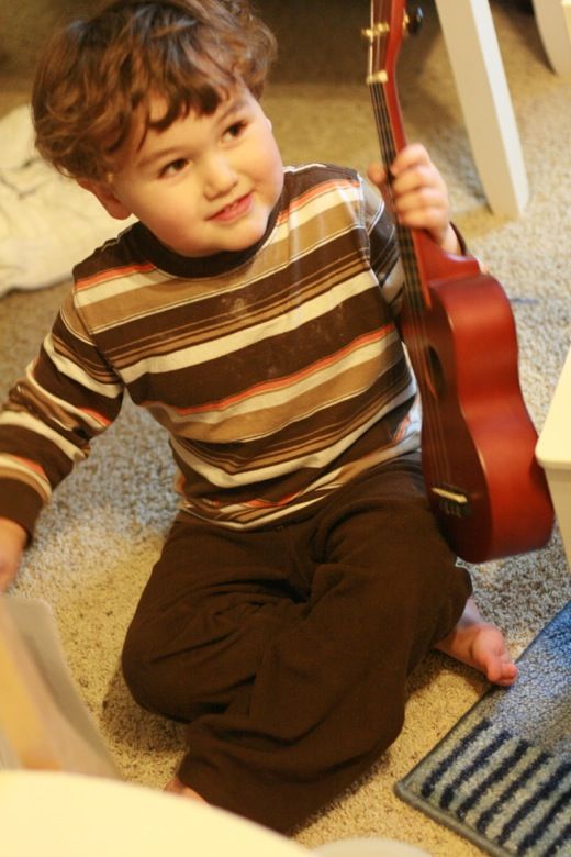 Celebrating Advent week to week: Hobo Mama boy playing ukulele — home church