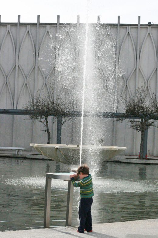 Photo Credit: Hobo Mama preschool boy playing with water apparatus at Pacific Science Center