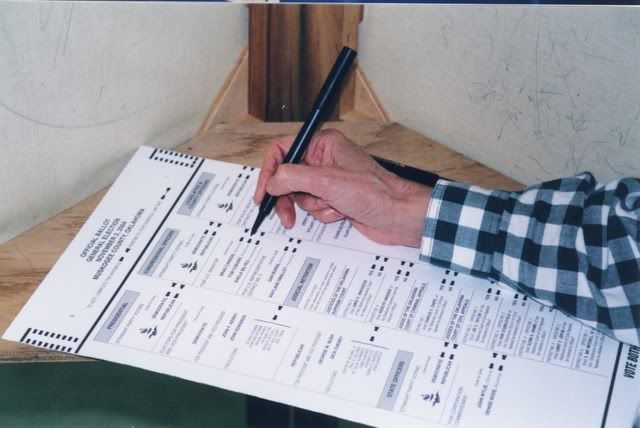 filling out ballot voting