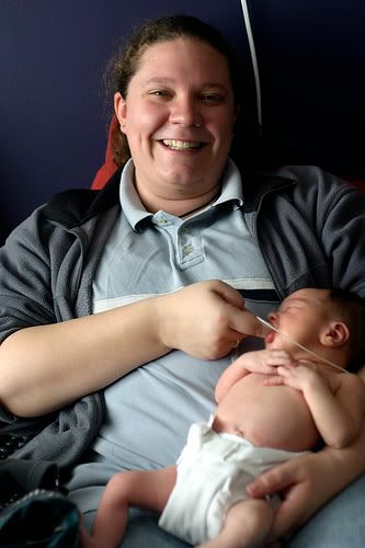 finger and tube feeding newborn baby