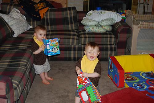 baby boys in front of couch