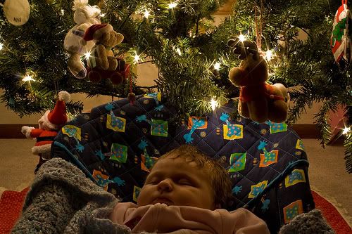 Best gift &#8212; newborn girl under Christmas tree