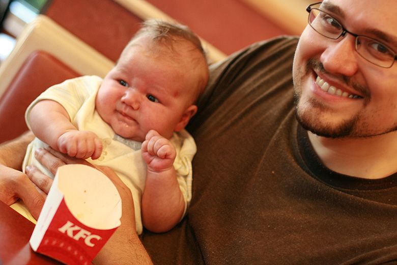I'm a natural parent, but you'd be surprised: Hobo Mama baby and dad at fast food restaurant