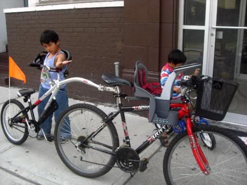 WeeRide tandem bike with child bike seat