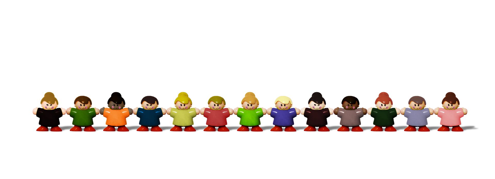 Photo Credit: spekulator / stock.xchng diverse kids toys lined up hand in hand