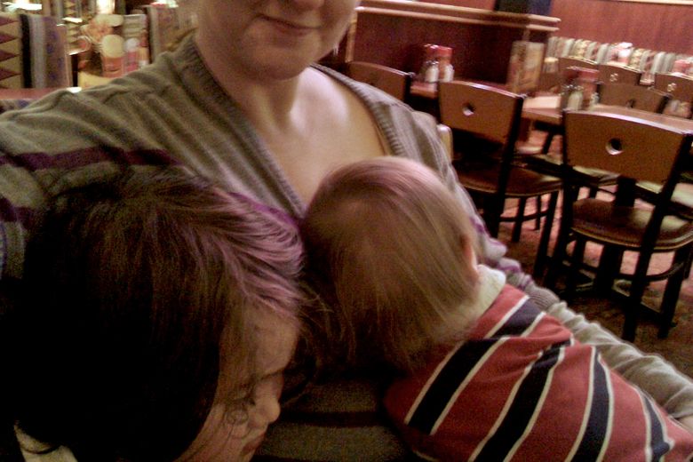 Sunday Surf: Sick days and a big octopus == Hobo Mama sad sick boys cuddling with mama at a restaurant