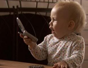 Babies by Thomas Balmes -- Hattie USA using a cellphone
