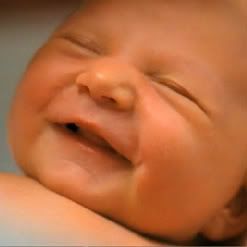 Babies by Thomas Balmes -- Hattie USA newborn smiling