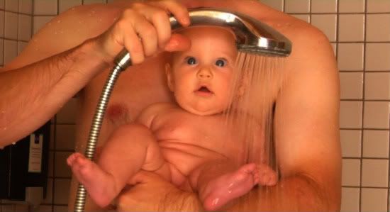 Babies by Thomas Balmes -- Hattie USA in the shower with dad
