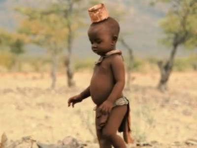 Babies by Thomas Balmes -- Ponijao Namibia balancing cup on head
