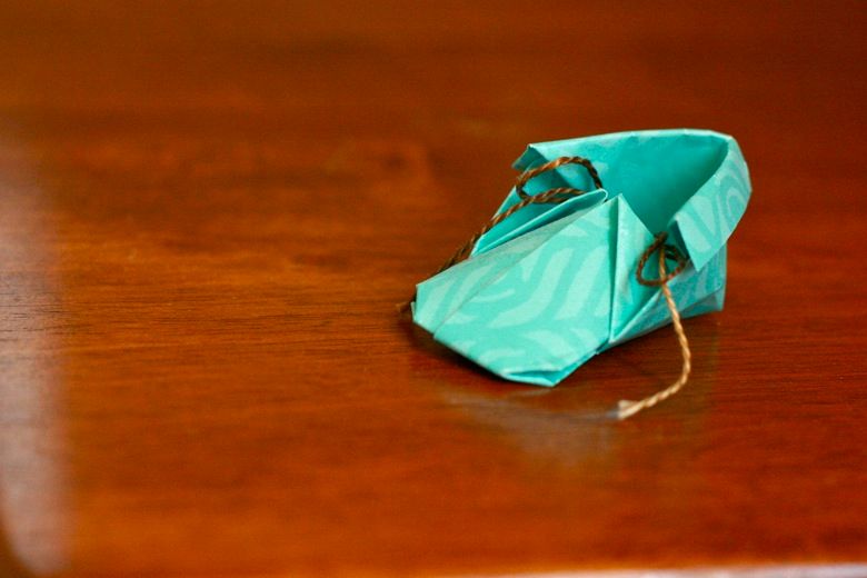 lone origami baby shoe