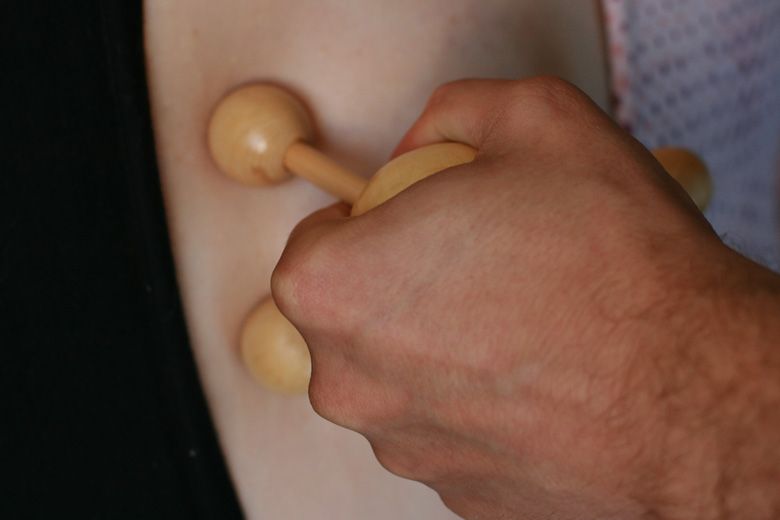 birth — counterpressure on back during labor by partner