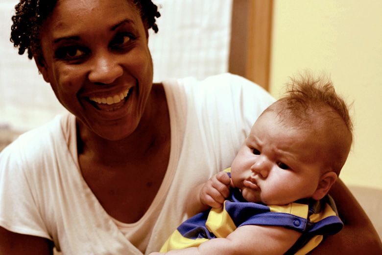 Michelle - midwife with newborn