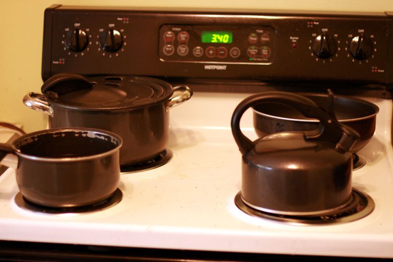 birth — heating boiling water on the stove during labor