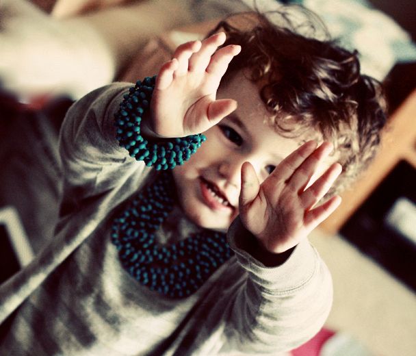 boy showing off new jewelry