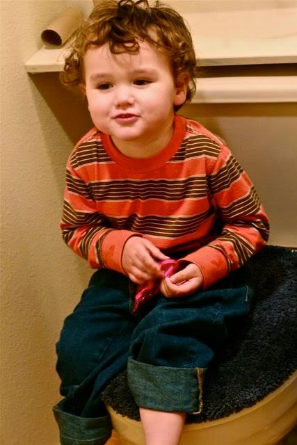 toddler playing with Diva Cup bag