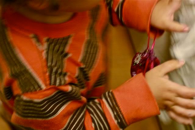 toddler playing with Diva Cup bag