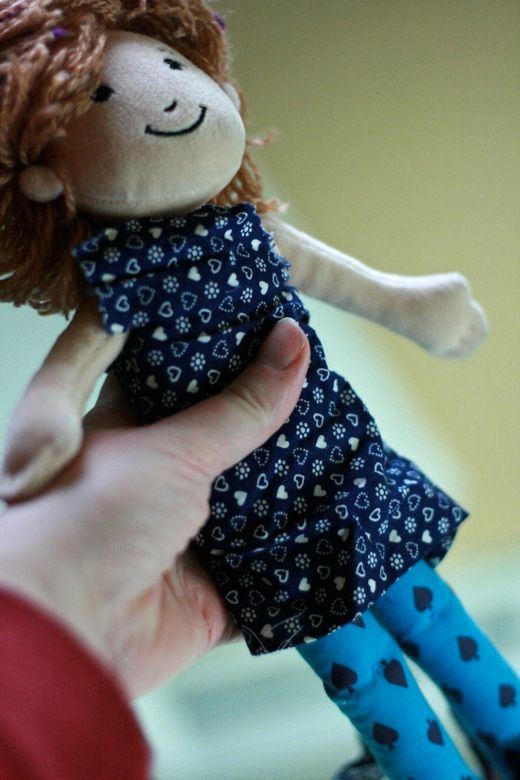 Photo Credit: Hobo Mama wrap fabric around doll — doll clothes craft tutorial