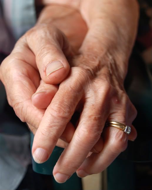 Senior Couple Holding Hands