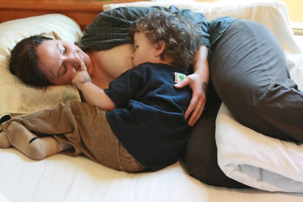cosleeping side-lying nursing with baby sitting up