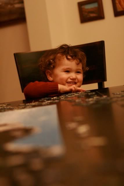 toddler looking cute at table