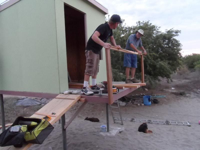 Doug and Lloyd putting on railings.