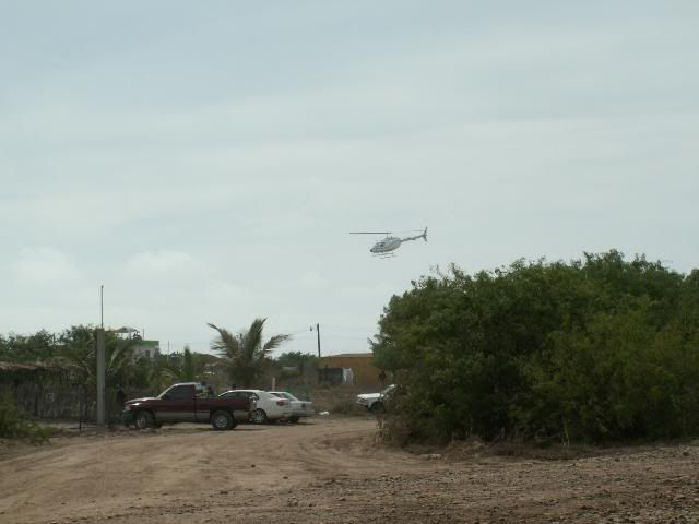 Yes, that's a helicopter setting down in front of our house.