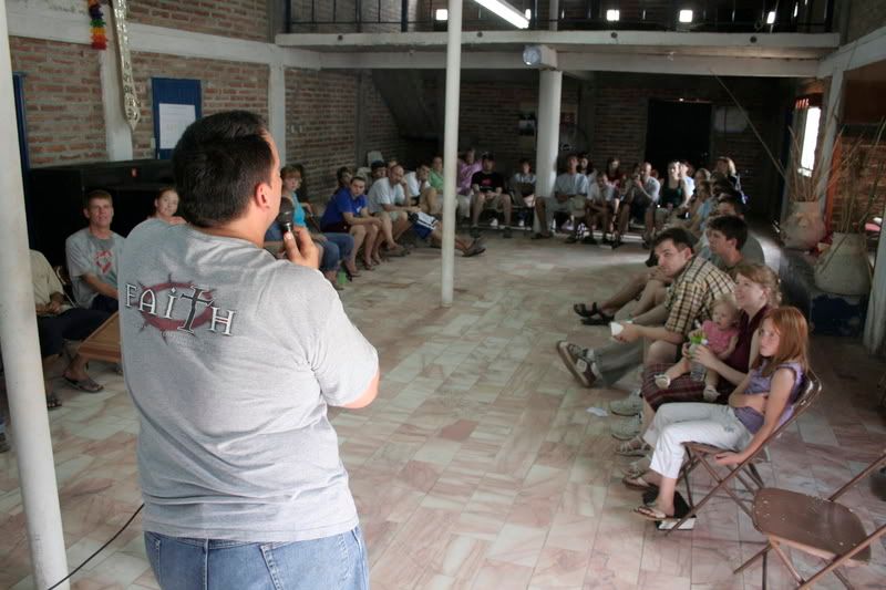 Pastor Tom leads an orientation meeting for the American missionaries