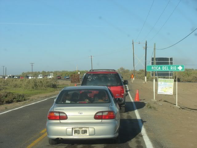 Line of Cars Trying to Leave Las Glorias