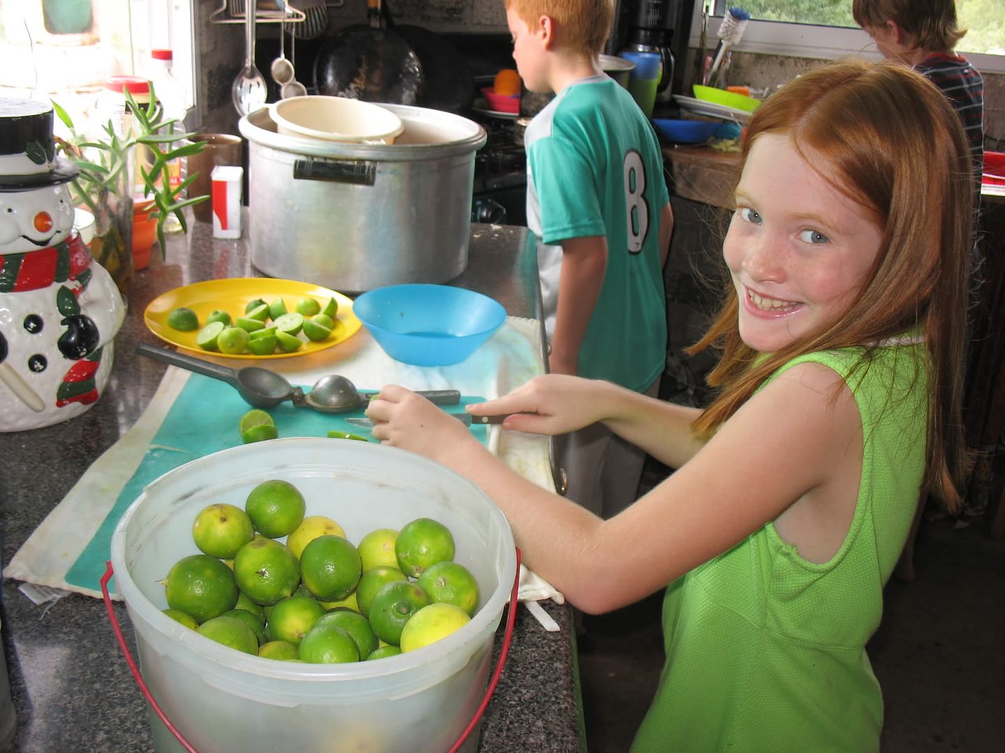 Evie squeezing limes