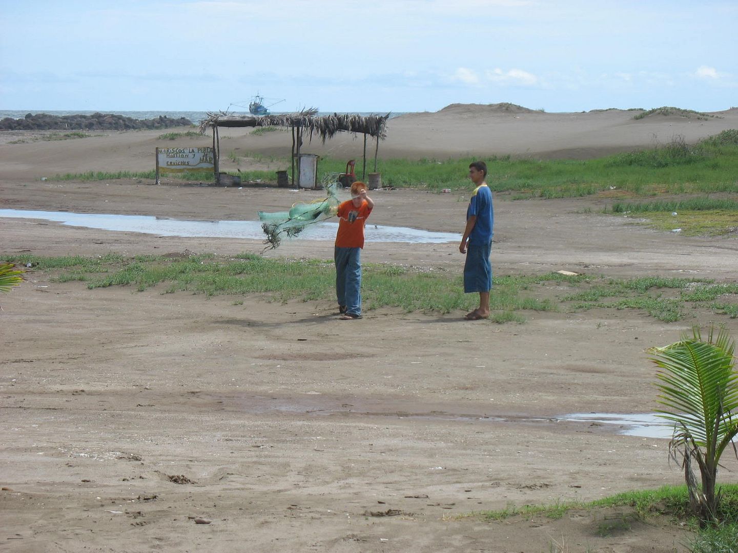 Caleb's friend Abimael teaches him how to use a taralla