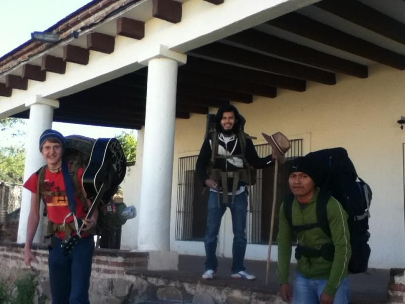 The guys with their backpacks as they prepare to leave Alamos.