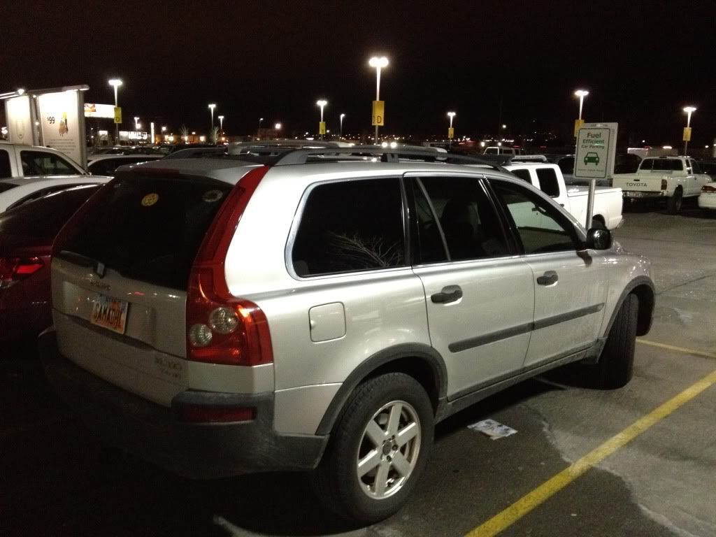 Fuel Efficient Vehicle Parking Space defiled by a Volvo SUV My Nissan